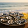 Vous adorez les huîtres ? Voici les 7 spots secrets en Bretagne à tester cet été : les immanquables pour déguster des fruits de mer bretons avec une vue unique, pendant les beaux jours
